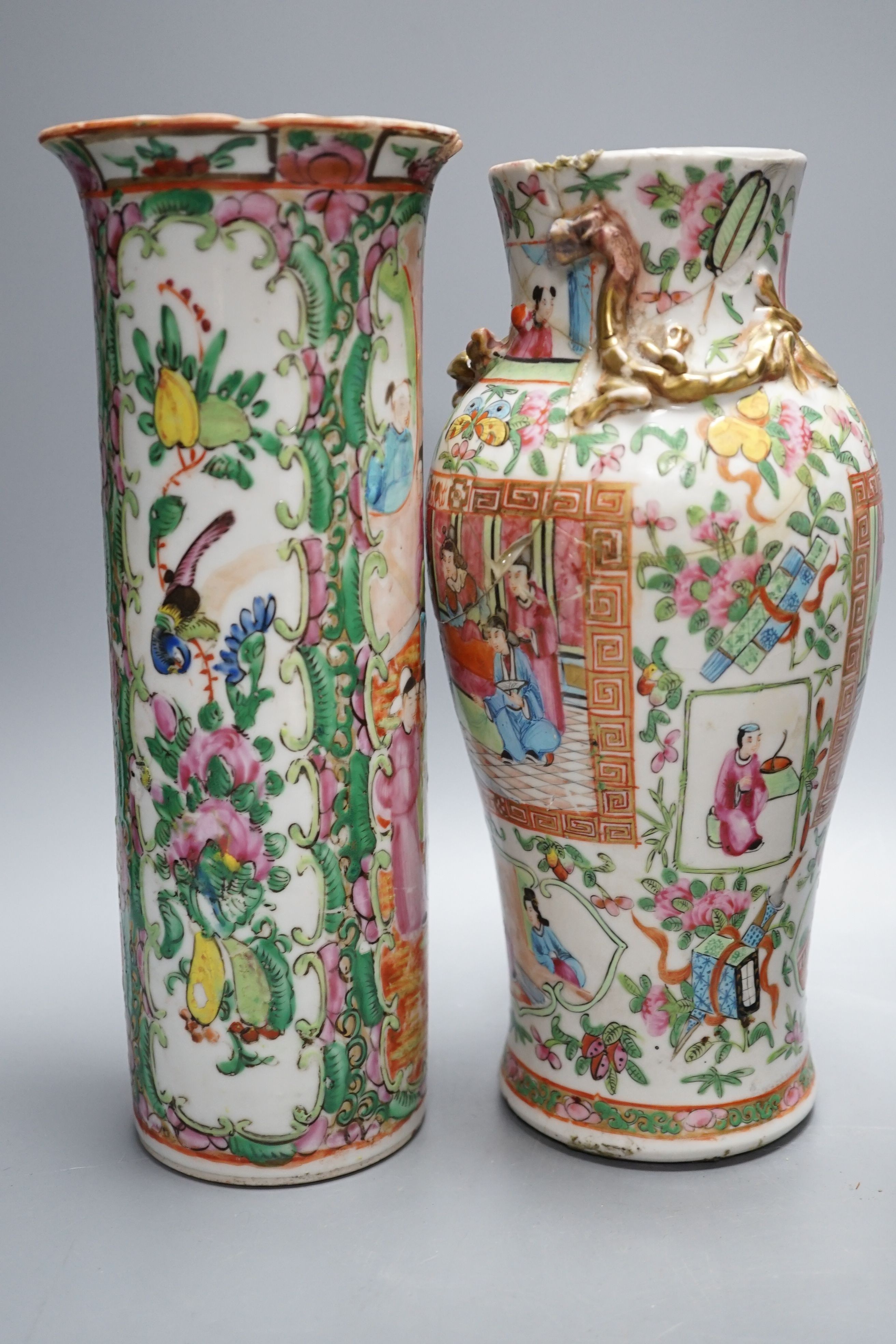 Two Chinese famille rose vases, two Chinese famille rose teapots and a blue ground enamelled jar tallest 26.5cm